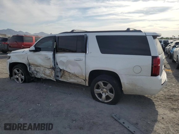 2015 Chevrolet Suburban LT with VIN 1GNSKJKC4FR691285, listed as a Copart auction lot 53137615 with 225,415 mi miles and Salvage Title. Bid and sale history available at DreamBid. Image 2.