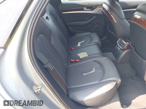 2013 Audi A8 4.0L with VIN WAUA2AFD5DN021950, listed as a IAAI auction lot 42472512 with 126,964 mi miles and . Bid and sale history available at DreamBid. Image 8.