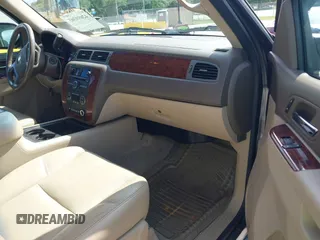 2012 Chevrolet Suburban LT with VIN 1GNSKJE72CR130111, listed as a IAAI auction lot 42699365 with 216,827 mi miles and . Bid and sale history available at DreamBid. Image 5.