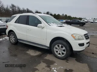 2006 Mercedes-Benz M 350 with VIN 4JGBB86E06A008120, listed as a Copart auction lot 44967155 with 153,856 mi miles and Salvage Title. Bid and sale history available at DreamBid. Image 4.
