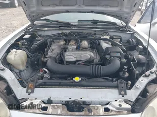 2003 Mazda MX-5 Miata Cloth with VIN JM1NB353730311899, listed as a IAAI auction lot 41929811 with 99,589 mi miles and . Bid and sale history available at DreamBid. Image 10.