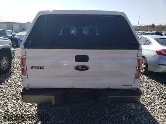 2013 Ford F-150 XL with VIN 1FTMF1EM7DKE99584, listed as a Copart auction lot 52521475 with 104,424 mi miles and Clean Title. Bid and sale history available at carsss.com. Image 6.