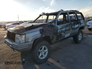 1998 Jeep Grand Cherokee Limited with VIN 1J4GZ88Z5WC119542, listed as a Copart auction lot 84562304 with 0 mi miles and Non Repairable. Bid and sale history available at carsss.com. Image 1.