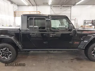 2021 Jeep Gladiator Rubicon with VIN 1C6JJTBGXML529108, listed as a IAAI auction lot 42139924 with 32,204 mi miles and . Bid and sale history available at DreamBid. Image 14.