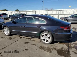 2015 Volkswagen CC R-Line with VIN WVWAN7AN6FE803304, listed as a Copart auction lot 73623223 with 103,160 mi miles. Bid and sale history available at carsss.com. Image 2.