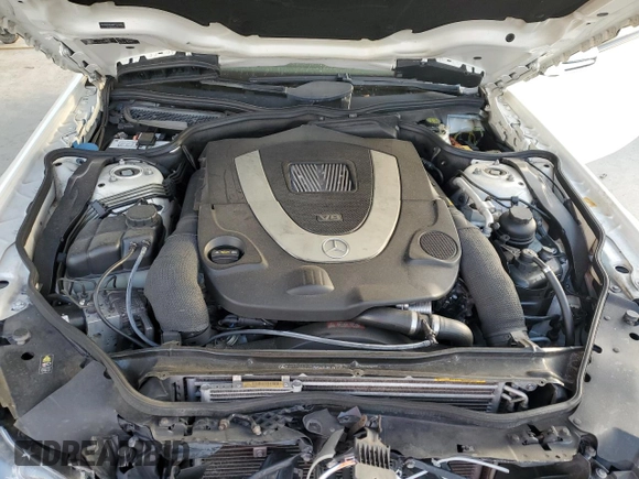 2011 Mercedes-Benz SL 550 z VIN WDBSK7BAXBF161245, wystawiony jako Copart lot #77153164 z przebiegiem 100 997 mil mil oraz Szkoda całkowita • Salvage title. Historia ofert i sprzedaży dostępna na DreamBid. Obrazek 11.