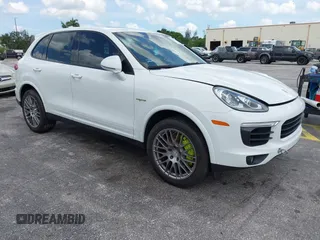2016 Porsche Cayenne S E-Hybrid with VIN WP1AE2A25GLA63698, listed as a IAAI auction lot 42694555 with 141,957 mi miles and . Bid and sale history available at DreamBid. Image 1.