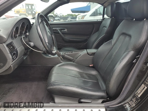 2000 Mercedes-Benz SLK 230 Kompressor with VIN WDBKK47F0YF149827, listed as a Copart auction lot 62524515 with 62,005 mi miles and Salvage title. Bid and sale history available at DreamBid. Image 7.
