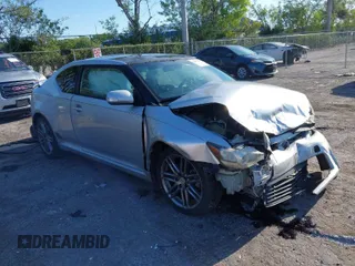 2012 Scion tC with VIN JTKJF5C77C3032559, listed as a IAAI auction lot 41892954 with 207,718 mi miles. Bid and sale history available at carsss.com. Image 1.