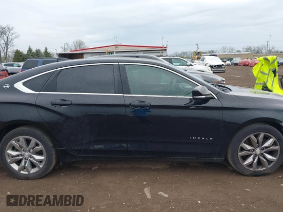 2017 Chevrolet Impala LT with VIN 1G1105S3XHU158948, listed as a IAAI auction lot 42036010 with 121,996 mi miles and . Bid and sale history available at DreamBid. Image 13.