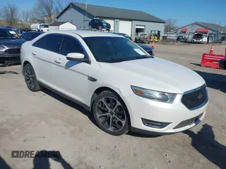 2014 Ford Taurus SEL z VIN 1FAHP2E81EG104137, wystawiony jako IAAI lot #42054432 z przebiegiem 146 046 mil mil oraz . Historia ofert i sprzedaży dostępna na DreamBid. Obrazek 1.