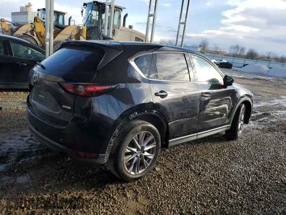 2019 Mazda CX-5 Grand Touring with VIN JM3KFADM2K1560309, listed as a Copart auction lot 46361345 with 160,863 mi miles and Salvage Title. Bid and sale history available at carsss.com. Image 3.