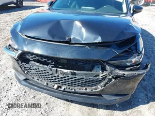 2022 Mazda 3 Select z VIN 3MZBPABL6NM304906, wystawiony jako IAAI lot #41634685 z przebiegiem 48 372 mil mil oraz . Historia ofert i sprzedaży dostępna na DreamBid. Obrazek 6.