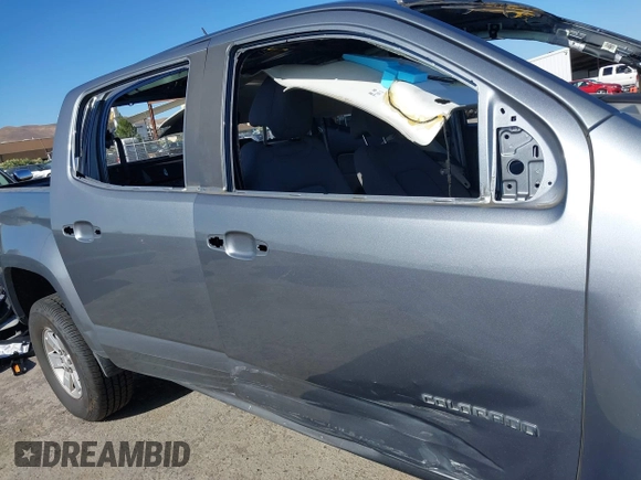 2018 Chevrolet Colorado 2WD Work Truck with VIN 1GCGSBEAXJ1199141, listed as a IAAI auction lot 42322849 with 77,811 mi miles and . Bid and sale history available at DreamBid. Image 14.