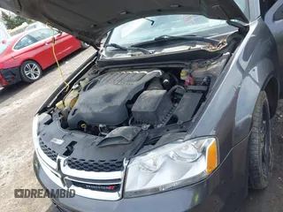 2014 Dodge Avenger SE with VIN 1C3CDZAG7EN218419, listed as a IAAI auction lot 41833778 with 133,192 mi miles. Bid and sale history available at carsss.com. Image 10.