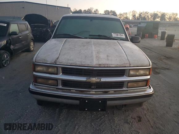 1996 Chevrolet Suburban z VIN 3GNFK16R7TG124404, wystawiony jako Copart lot #77361264 z przebiegiem 256 935 mil mil oraz Szkoda całkowita • Salvage title. Historia ofert i sprzedaży dostępna na DreamBid. Obrazek 5.