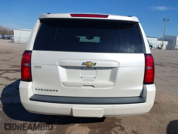 2015 Chevrolet Suburban LT with VIN 1GNSKJKC9FR717038, listed as a IAAI auction lot 41815942 with 123,095 mi miles and . Bid and sale history available at DreamBid. Image 16.