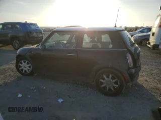 2004 MINI Hardtop with VIN WMWRC33484TJ59008, listed as a Copart auction lot 46003105 with 83,303 mi miles and Salvage Title. Bid and sale history available at DreamBid. Image 2.