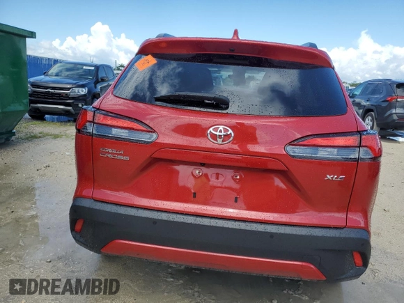 2022 Toyota Corolla Cross XLE with VIN 7MUDAAAG8NV014321, listed as a Copart auction lot 62181355 with 24,550 mi miles and Non repairable. Bid and sale history available at DreamBid. Image 6.