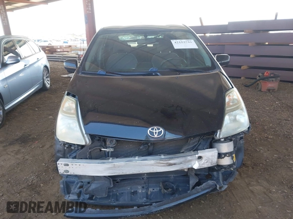 2007 Toyota Prius with VIN JTDKB20U277597719, listed as a IAAI auction lot 42153731 with 148,174 mi miles and . Bid and sale history available at DreamBid. Image 13.