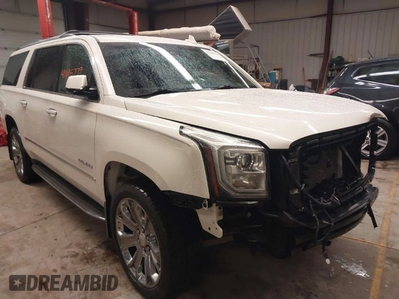 2015 GMC Yukon XL Denali with VIN 1GKS2JKJ1FR635901, listed as a IAAI auction lot 41805739 with 120,998 mi miles and . Bid and sale history available at carsss.com. Image 1.
