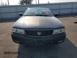 2002 Cadillac Seville Touring STS z VIN 1G6KY54922U210928, wystawiony jako Copart lot #71214564 z przebiegiem Nie podano mil oraz Tytuł czysty. Historia ofert i sprzedaży dostępna na DreamBid. Obrazek 5.