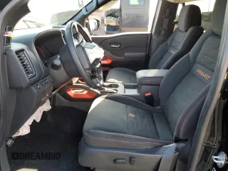 2023 Nissan Frontier Pro-4X with VIN 1N6ED1EK9PN653818, listed as a Copart auction lot 50932735 with 55,466 mi miles and Salvage title. Bid and sale history available at DreamBid. Image 7.
