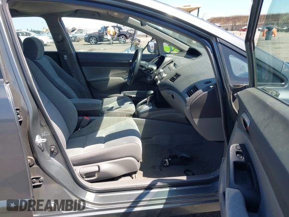2009 Honda Civic LX z VIN 2HGFA16569H302404, wystawiony jako IAAI lot #42348074 z przebiegiem 157 897 mil mil oraz . Historia ofert i sprzedaży dostępna na DreamBid. Obrazek 5.