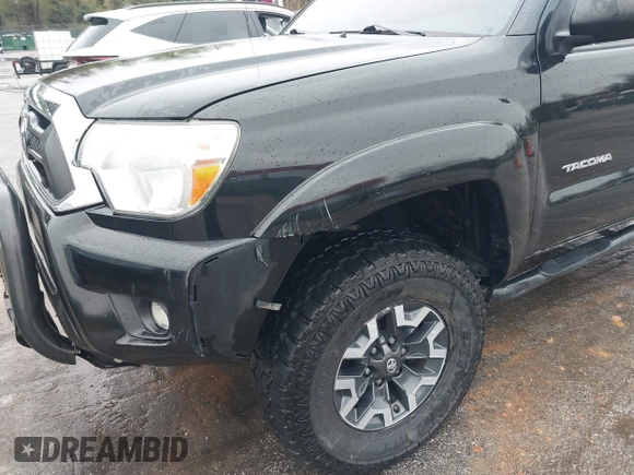 2015 Toyota Tacoma with VIN 3TMLU4ENXFM185371, listed as a IAAI auction lot 41952513 with 87,128 mi miles and . Bid and sale history available at DreamBid. Image 17.