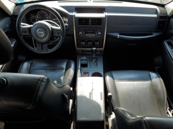 2012 Jeep Liberty Sport with VIN 1C4PJMAK0CW182156, listed as a Copart auction lot 66534525 with 128,133 mi miles and Clean title. Bid and sale history available at DreamBid. Image 8.