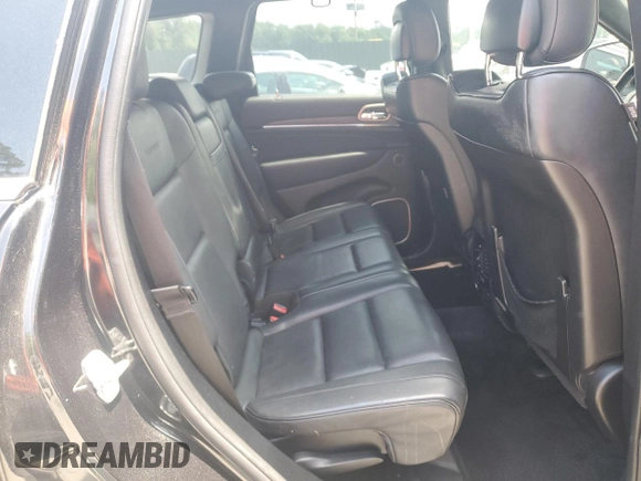 2015 Jeep Grand Cherokee Summit z VIN 1C4RJEJG7FC185426, wystawiony jako Copart lot #62562735 z przebiegiem 133 418 mil mil oraz Szkoda całkowita • Salvage title. Historia ofert i sprzedaży dostępna na DreamBid. Obrazek 11.