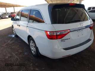 2013 Honda Odyssey LX with VIN 5FNRL5H2XDB028879, listed as a IAAI auction lot 41958988 with 49,868 mi miles and . Bid and sale history available at carsss.com. Image 3.