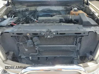 2011 Ford F-150 XL with VIN 1FTFW1EF5BFA04024, listed as a Copart auction lot 64267205 with 211,116 mi miles and Salvage title. Bid and sale history available at DreamBid. Image 11.