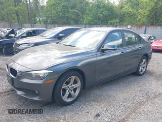 2014 BMW 3 Series 320i xDrive with VIN WBA3C3C57EP662795, listed as a IAAI auction lot 42267683 with 153,451 mi miles and . Bid and sale history available at DreamBid. Image 23.