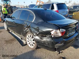 2006 BMW 3 Series 330i with VIN WBAVB33536KS34412, listed as a IAAI auction lot 41872877 with 196,697 mi miles. Bid and sale history available at carsss.com. Image 3.