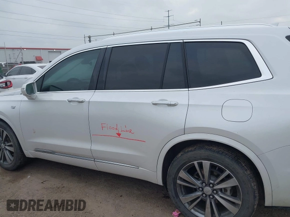 2020 Cadillac XT6 FWD Premium Luxury with VIN 1GYKPCRS2LZ101061, listed as a IAAI auction lot 42113360 with Not provided miles and . Bid and sale history available at DreamBid. Image 14.