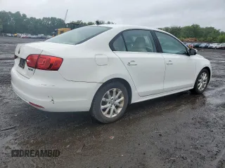 2013 Volkswagen Jetta SE z VIN 3VWBX7AJXDM432714, wystawiony jako Copart lot #61093845 z przebiegiem 69 098 mil mil oraz Czysty tytuł • Clean title. Historia ofert i sprzedaży dostępna na DreamBid. Obrazek 3.