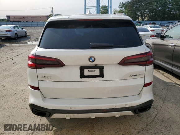 2021 BMW X5 xDrive40i with VIN 5UXCR6C00M9E75622, listed as a Copart auction lot 58568005 with Not provided miles and Salvage title. Bid and sale history available at DreamBid. Image 6.