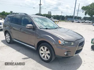 2011 Mitsubishi Outlander SE with VIN JA4JT3AW2BU033118, listed as a IAAI auction lot 42695356 with 196,937 mi miles and . Bid and sale history available at DreamBid. Image 1.