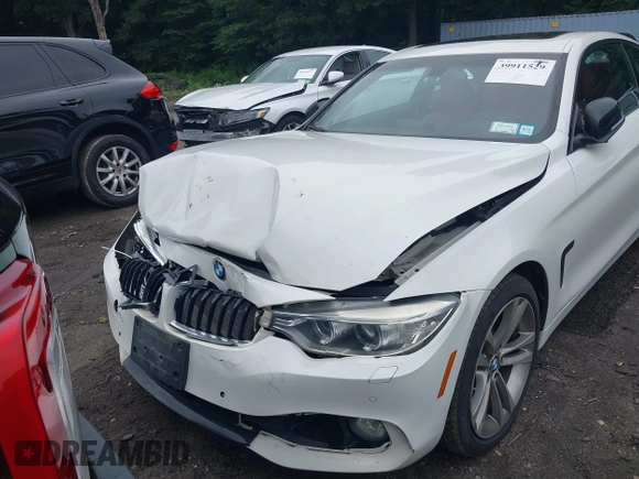 2015 BMW 4 Series 428i xDrive z VIN WBA3N9C56FK246359, wystawiony jako IAAI lot #39911529 z przebiegiem 137 494 mil mil oraz . Historia ofert i sprzedaży dostępna na DreamBid. Obrazek 6.