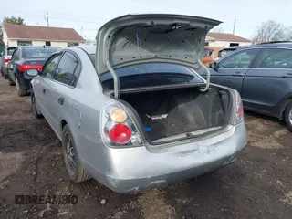2004 Nissan Altima S with VIN 1N4AL11D74C140091, listed as a IAAI auction lot 41627388 with 999,999 mi miles. Bid and sale history available at carsss.com. Image 6.