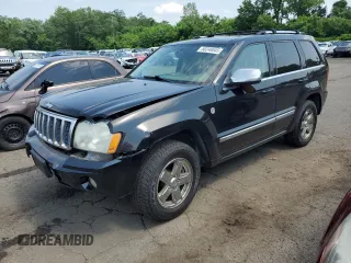 2006 Jeep Grand Cherokee Overland with VIN 1J8HR68216C118267, listed as a Copart auction lot 60248645 with 221,788 mi miles and Salvage title. Bid and sale history available at DreamBid. Image 1.
