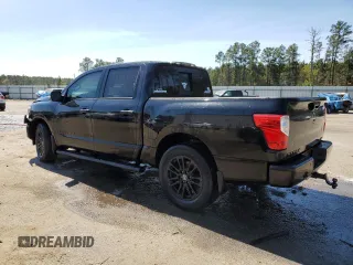 2018 Nissan Titan SV with VIN 1N6AA1E61JN520777, listed as a Copart auction lot 50312605 with 62,122 mi miles and Salvage Title. Bid and sale history available at DreamBid. Image 2.
