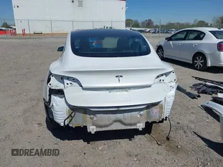 2023 Tesla Model 3 with VIN 5YJ3E1EA7PF592966, listed as a IAAI auction lot 41879794 with 13,423 mi miles and . Bid and sale history available at carsss.com. Image 17.