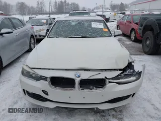 2014 BMW 3 Series 328i with VIN WBA3C1C51EK106435, listed as a IAAI auction lot 41202983 with 142,135 mi miles. Bid and sale history available at carsss.com. Image 12.