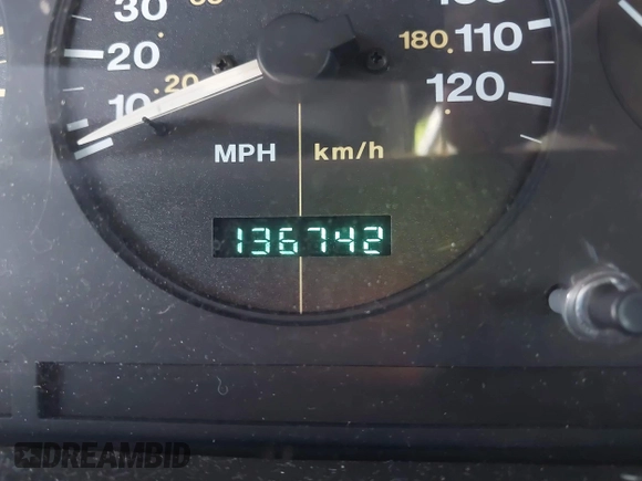 1996 Jeep Grand Cherokee Laredo with VIN 1J4FX58S2TC397006, listed as a IAAI auction lot 41836108 with 136,742 mi miles. Bid and sale history available at carsss.com. Image 7.