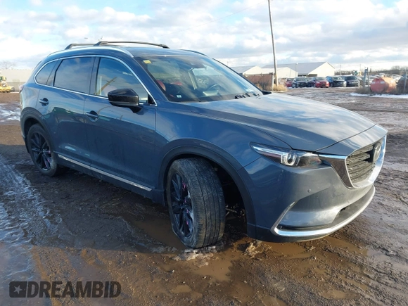 2022 Mazda CX-9 Grand Touring with VIN JM3TCBDYXN0618313, listed as a IAAI auction lot 41452750 with 34,356 mi miles and . Bid and sale history available at DreamBid. Image 1.