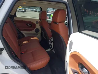 2015 Land Rover Range Rover Evoque Prestige z VIN SALVV2BG4FH076675, wystawiony jako IAAI lot #42138353 z przebiegiem 99 751 mil mil oraz . Historia ofert i sprzedaży dostępna na DreamBid. Obrazek 8.