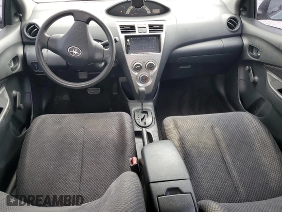 2007 Toyota Yaris with VIN JTDBT923271052472, listed as a Copart auction lot 50942975 with 147,363 mi miles and Salvage Title. Bid and sale history available at DreamBid. Image 8.