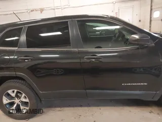 2015 Jeep Cherokee Sport z VIN 1C4PJMAB8FW764171, wystawiony jako IAAI lot #42460585 z przebiegiem 204 179 mil mil oraz . Historia ofert i sprzedaży dostępna na DreamBid. Obrazek 13.